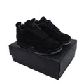Air Jordan 4 x KAWS Black - SUELA ILUMINOSA