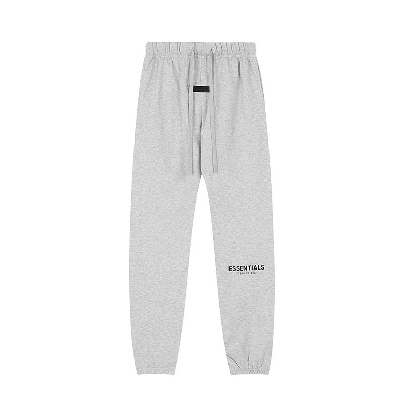 Pantalón Buzo ESSENTIALS gris claro