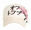 Gorra Katakana japonés con rama de cerezo