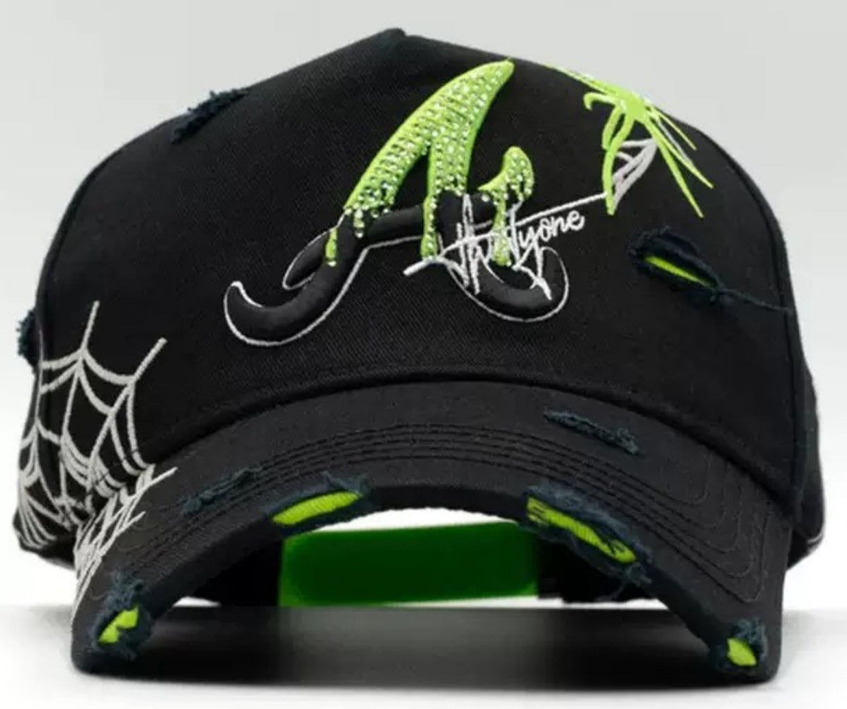 Gorra Camaleón verde neón con telaraña