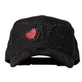Gorra Salpicadura roja abstracta con letra N