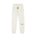 Pantalón Buzo ESSENTIALS gris avena
